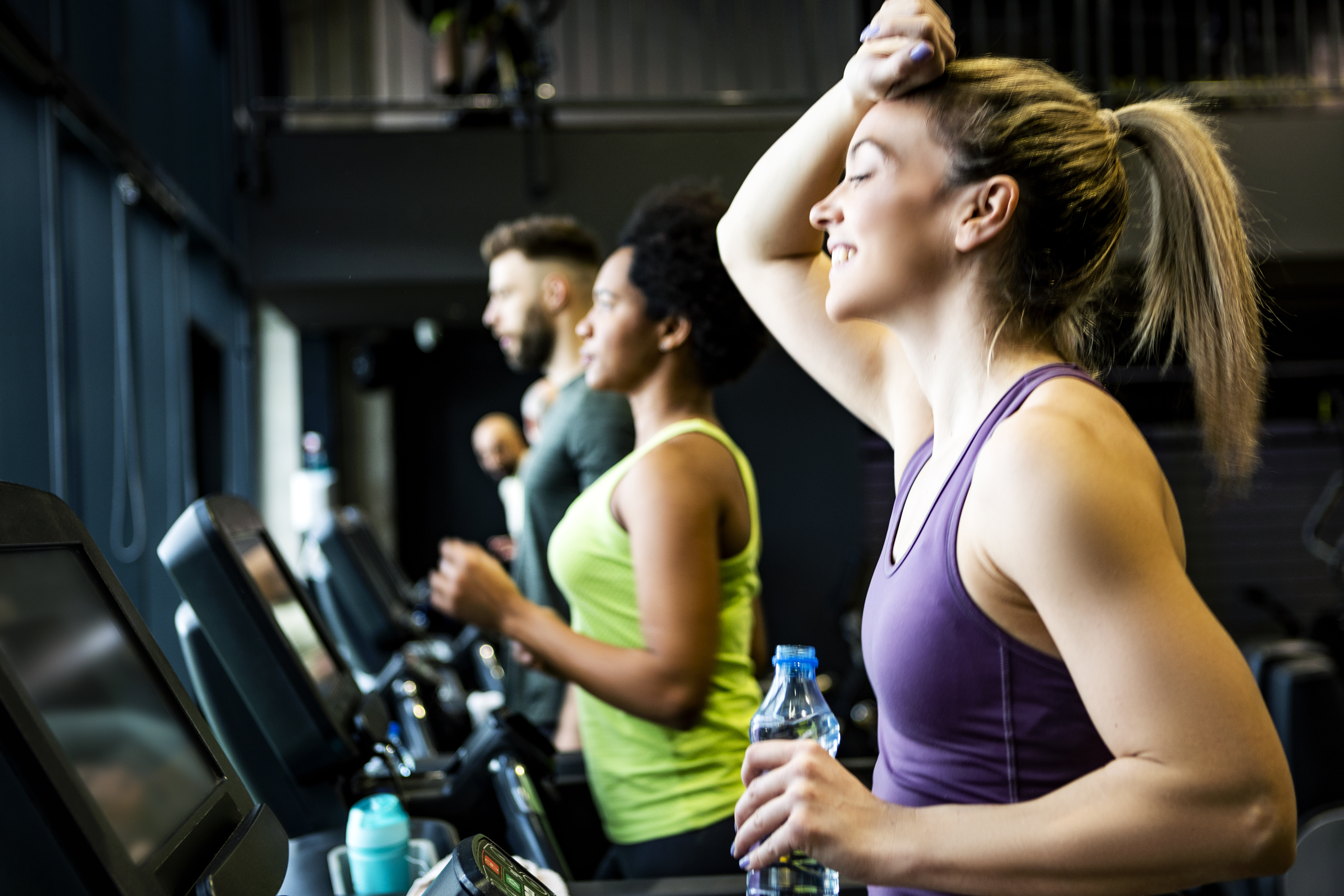 Athletes training on treadmills